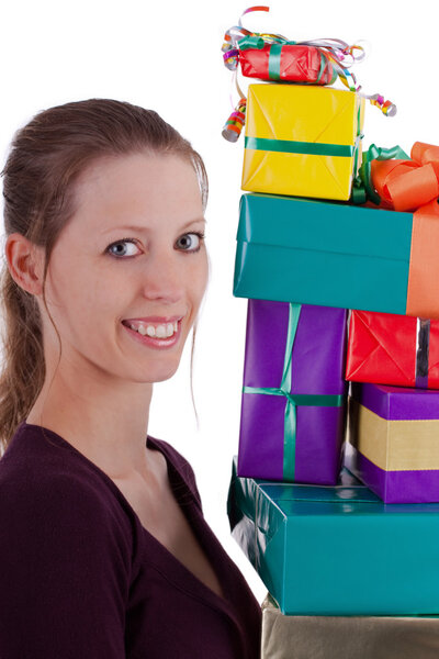 pretty young woman carrying a lot of gifts