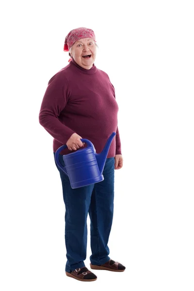 Senior holding a watering can — стоковое фото