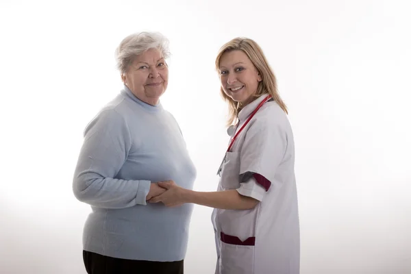 Senior with nurse — Photo