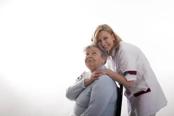 Nurse with senior — Stockfoto