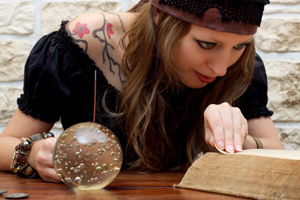 Female fortune teller suggests the future