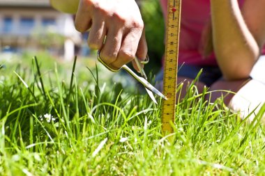 Woman takes it to mow the lawn exactly