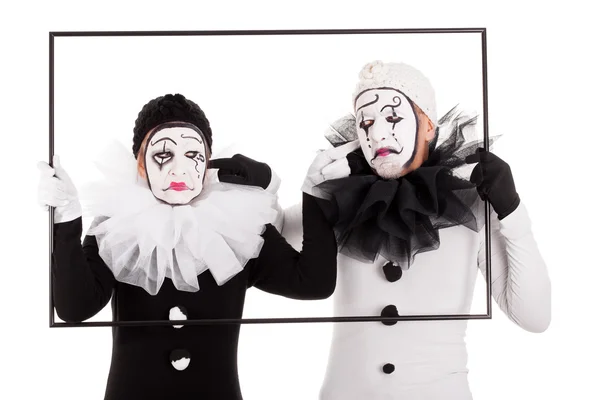 Два клоуни в рамці можуть чути один одного — стокове фото