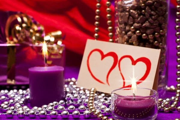 Elegant background with beads and candles — Stock Photo, Image