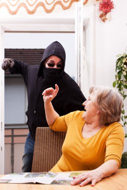 Perpetrators of violence, coat of female senior