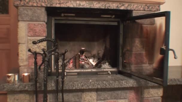 Fireplace with opened protection glass door two — Stock Video