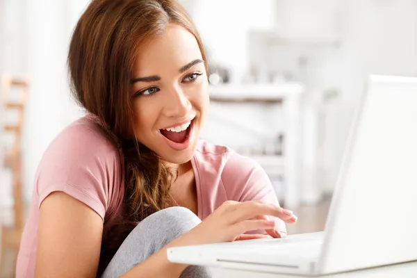 Attractive young teenager surfing the internet — Stock Photo, Image