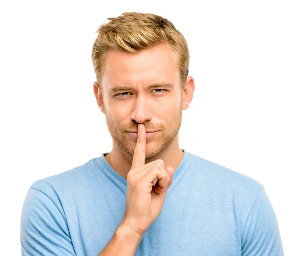Sexy man with finger on lips — Stock Photo, Image