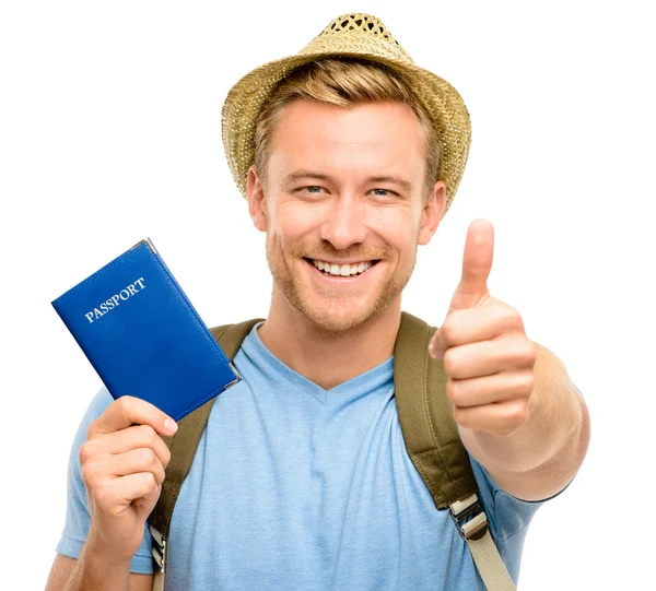 Feliz jovem turista homem segurando passaporte fundo branco — Fotografia de Stock