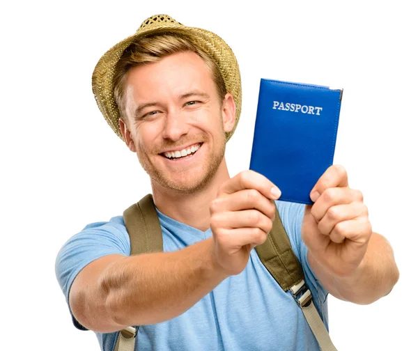 Happy young tourist man holding passport white background — Stock Photo, Image