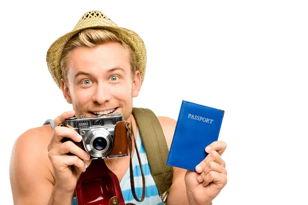 Happy young tourist man holding passport retro camera white back — Stock Photo, Image