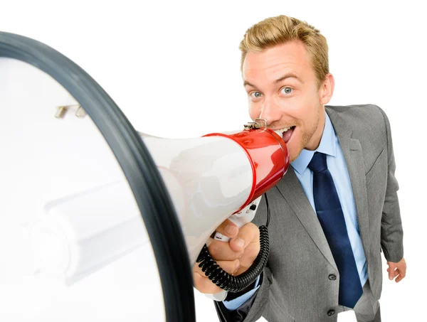 Jovem empresário feliz gritando com megafone no backgr branco — Fotografia de Stock