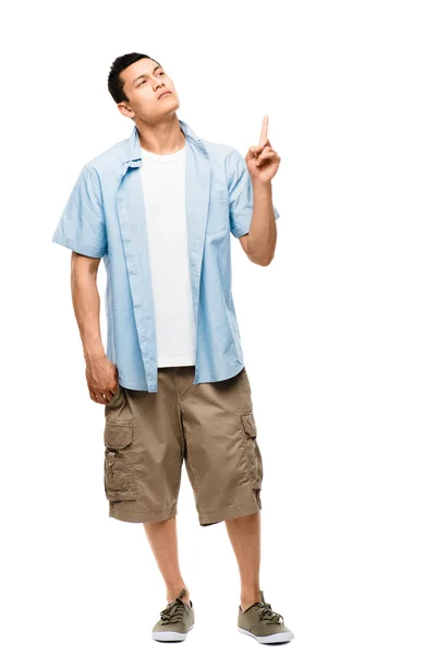 Unhappy mixed race man pointing up isolated on clean white backg — Stock Photo, Image