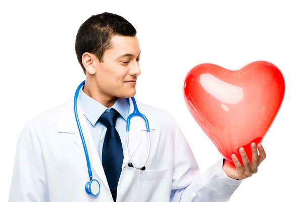 Asian male doctor holding human heart — Stock Photo, Image