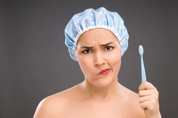 Geeky teenager in the bathroom — Stock Photo, Image