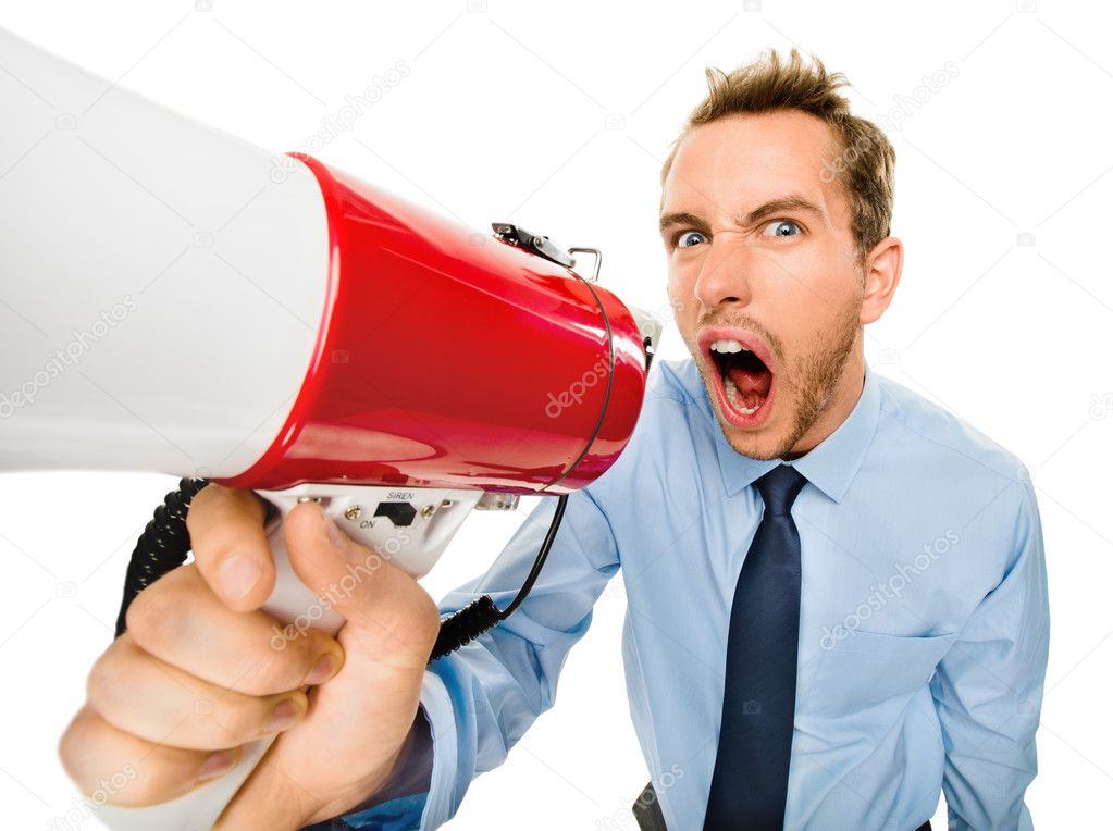Aggressive businessman shouting with megaphone