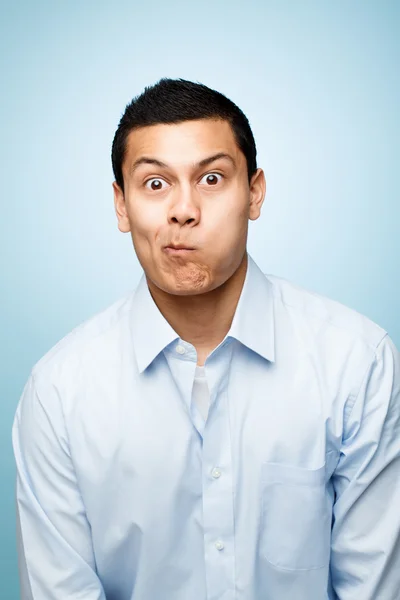 Zbliżenie portret szalony głupie śmieszne twarz młodego człowieka — Zdjęcie stockowe