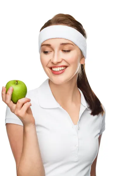 Mujer joven sosteniendo manzana verde — Foto de Stock