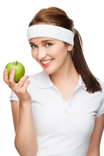 Young woman holding green apple — Stock Photo, Image