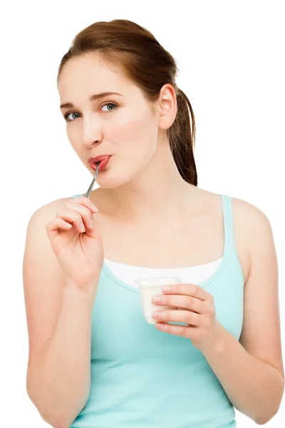 Young caucasian woman eating yogurt Stock Picture