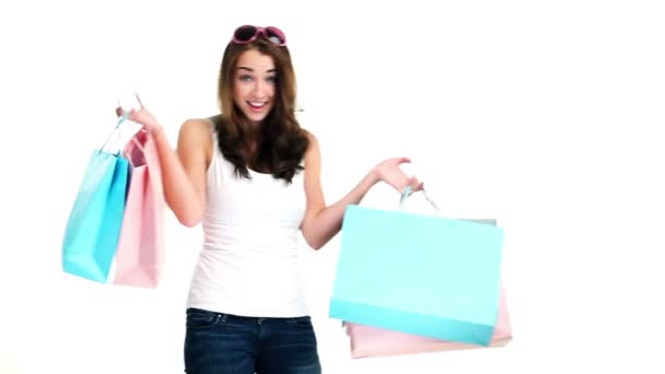 Mujer sexy sosteniendo bolsas de compras — Vídeos de Stock