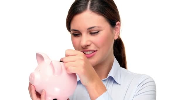 Woman with the pig moneybox — Stock Video