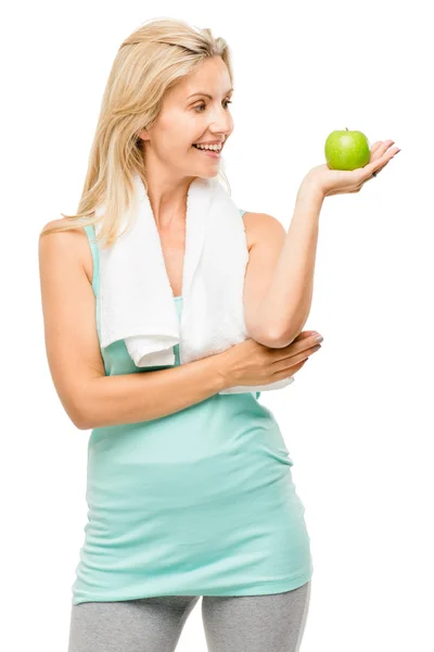 Beyaz arka plan üzerinde izole sağlıklı Olgun kadın egzersiz yeşil elma — Stok fotoğraf