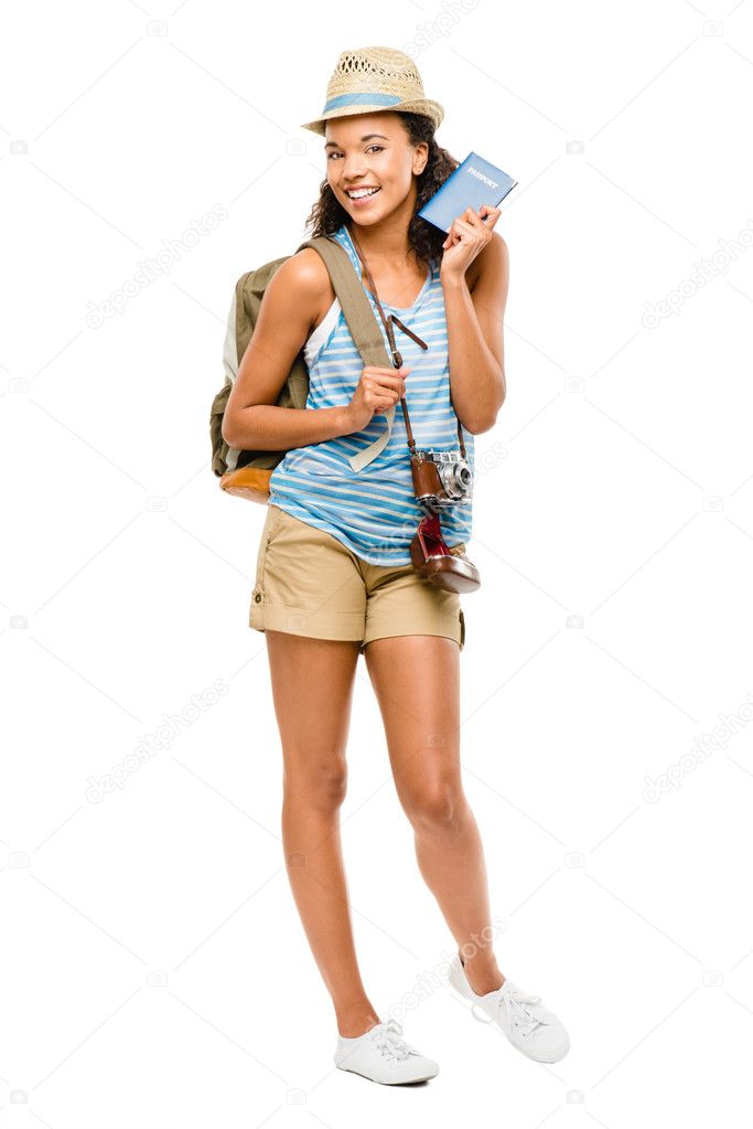 Happy African American woman tourist holding passport