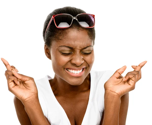 Cute African American woman fingers crossed isolated on white ba — Stock Photo, Image