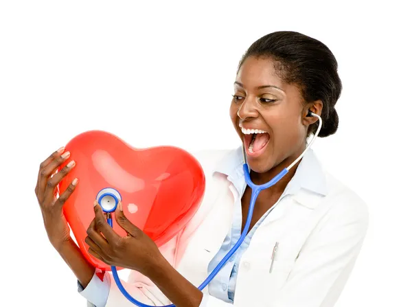 Happy African American trusted Nurse holding Red heart — Stock Photo, Image