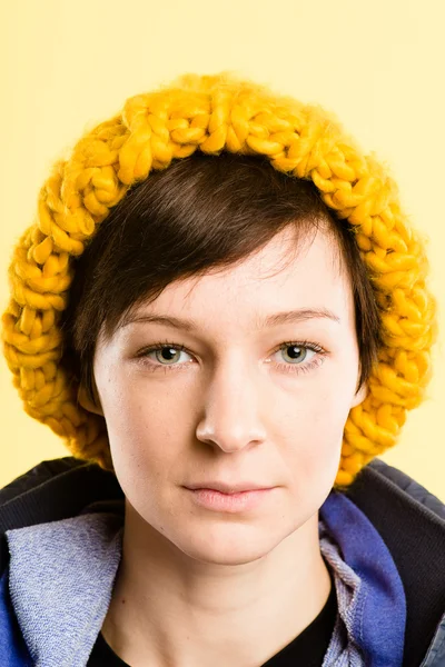 Serious woman portrait real high definition yellow backgr — Stock Photo, Image