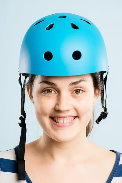 Funny woman wearing cycling helmet portrait real — Stock Photo, Image