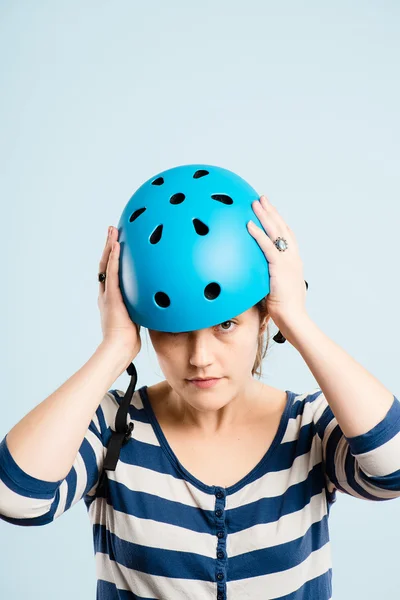 Funny woman wearing cycling helmet portrait real — Stock Photo, Image