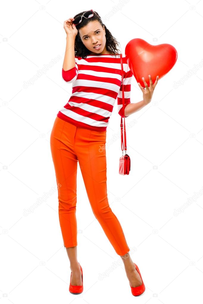 Valentines day portrait of Pretty Mixed race woman holding red h