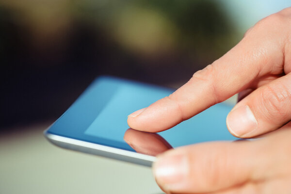 Man using digital tablet