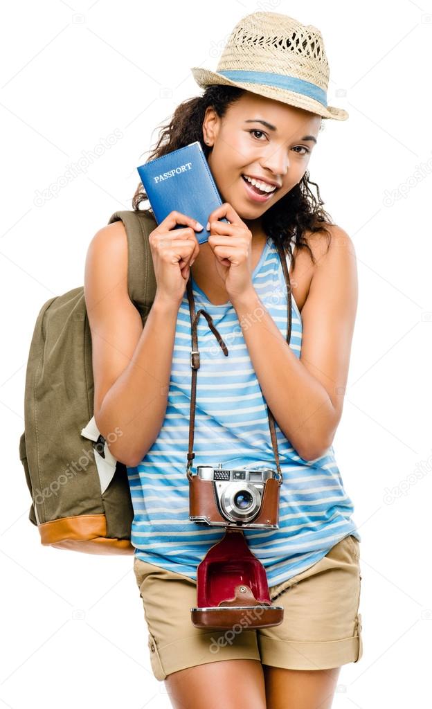 Happy African American woman tourist holding passport