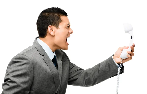 Asian businessman shouting in phone — Stock Photo, Image