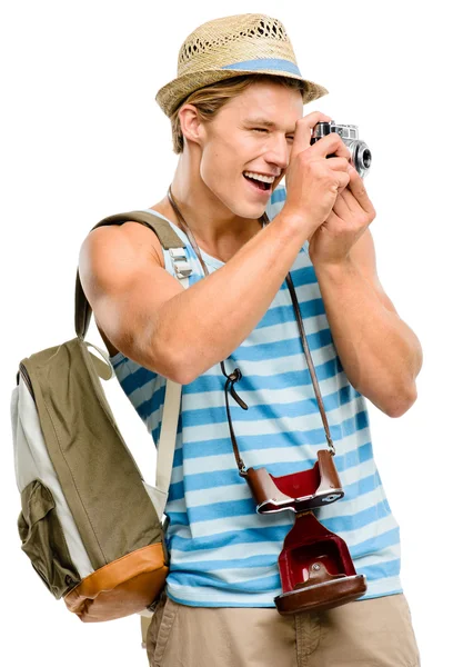 Happy tourist man photographing vintage camera isolated on white — Stock Photo, Image