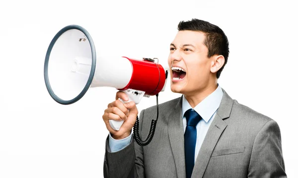 Crazy Asian businessman screaming in megaphone — Stock Photo, Image