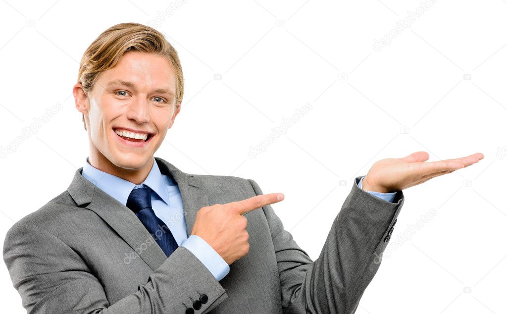 Happy businessman pointing isolated on white background