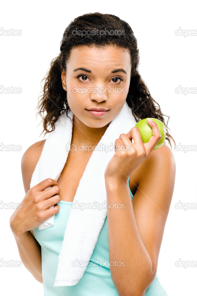 Healthy young mixed race woman holding green apple