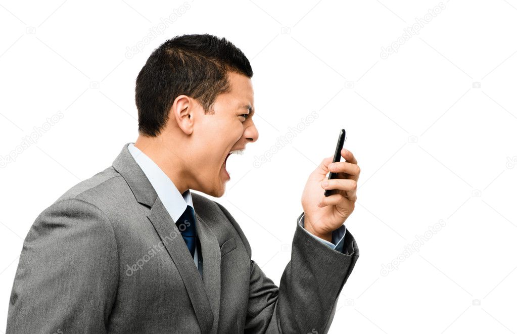 asian businessman shouting in phone