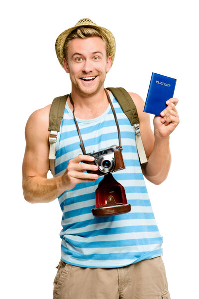 Happy tourist holding passport retro camera isolated on white