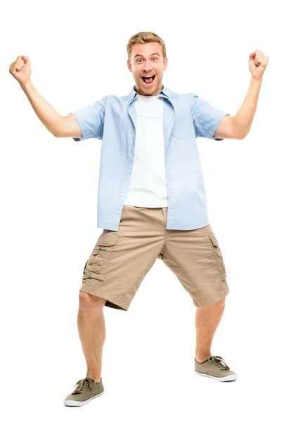 Šťastný mladý muž slaví úspěch na bílém pozadí — Stock fotografie
