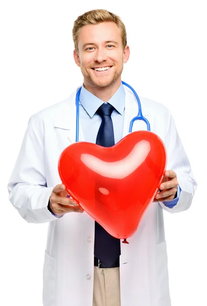 Orvos holding szív fehér háttér — Stock Fotó