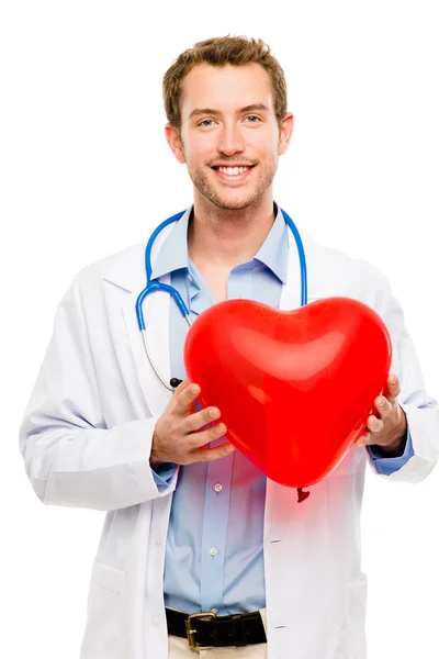 Doctor holding heart white background — Stock Photo, Image