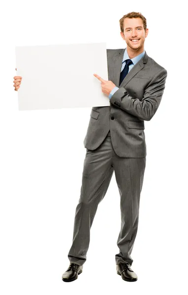 Hombre de negocios sosteniendo cartel blanco vacío mostrando espacio de copia — Foto de Stock