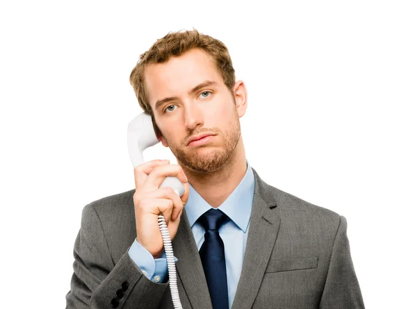 Agente de atendimento ao cliente segurando telefone fundo branco — Fotografia de Stock
