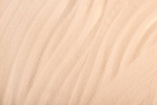 Beach sand texture background. Full frame shot.