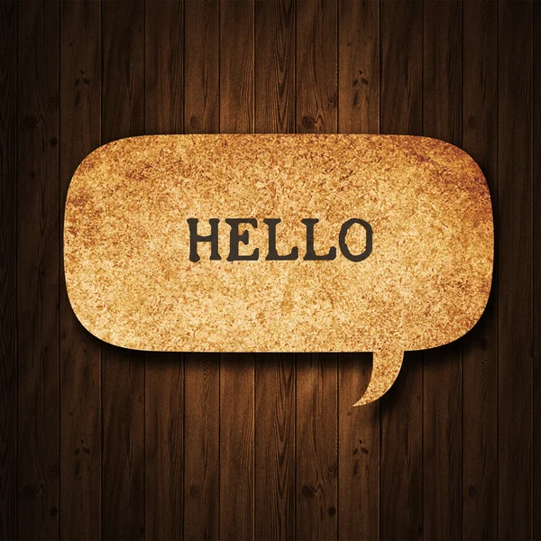 Speech bubble paper on wood background — Stock Photo, Image